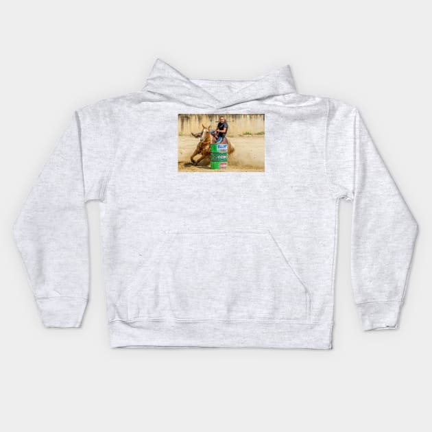 Barrel racer rounding a barrel Kids Hoodie by joesaladino